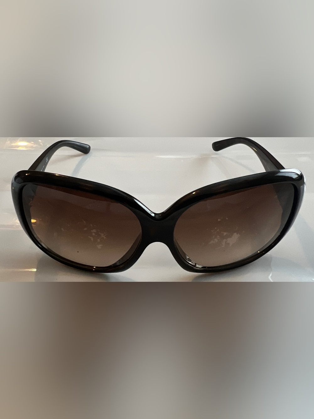 Prada Black Frame Sunglasses with Brown Gradient Lenses